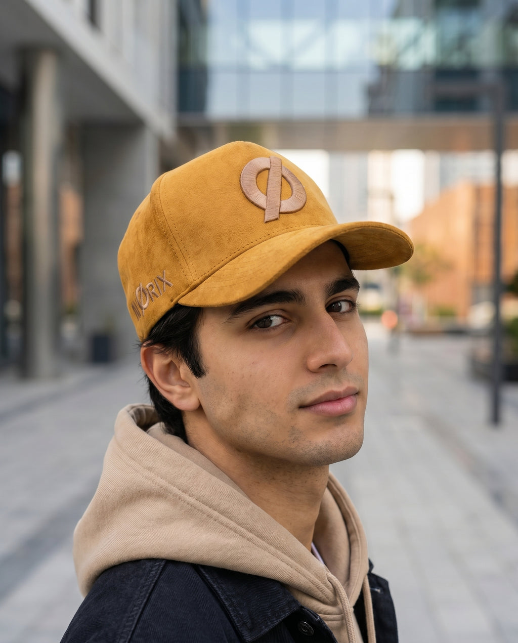 Man wearing NØRIX Mustard Gold suede snapback cap – Dubai streetwear, NORIX UAE