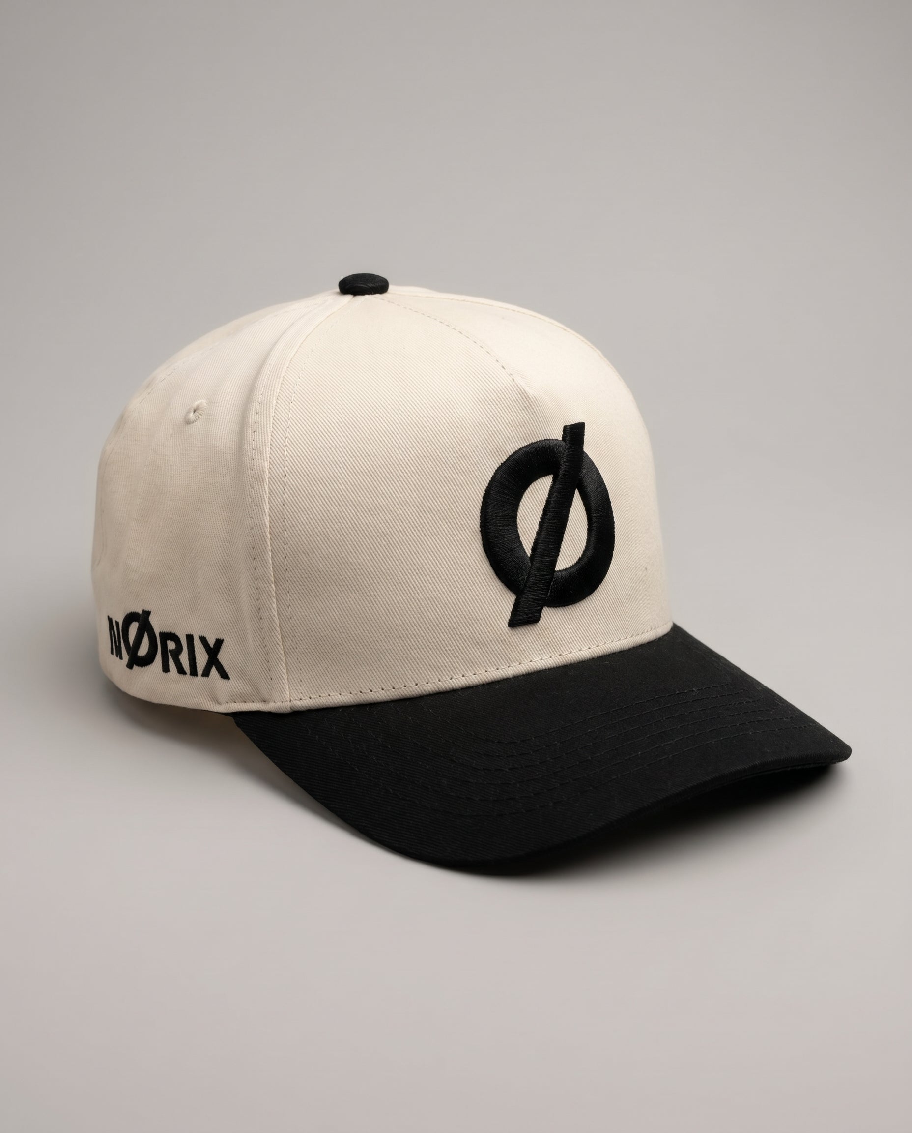 NØRIX NORIX off-white and black Core snapback cap – embroidered Ø logo, premium streetwear cap Dubai UAE